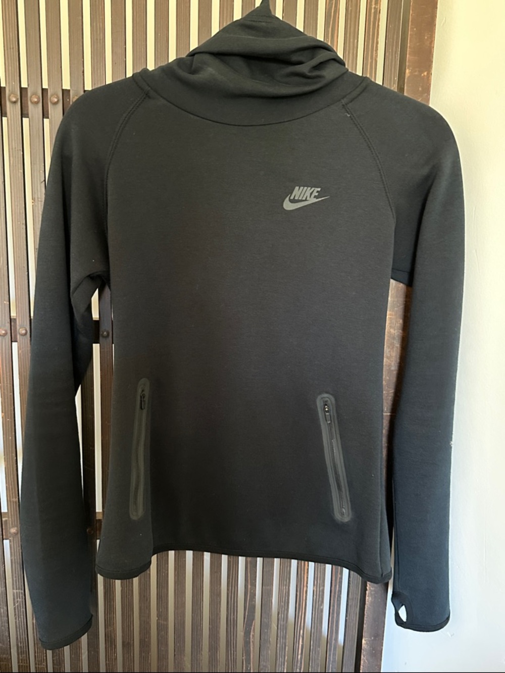 Nike Black Performance Pullover Hoodie with Zip Pockets and Thumb Holes